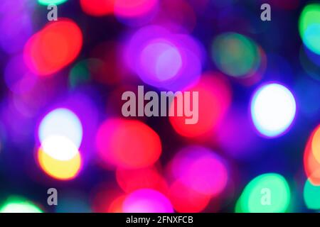 Multicolor Bokeh in a blue natural background, defocused Stock Photo