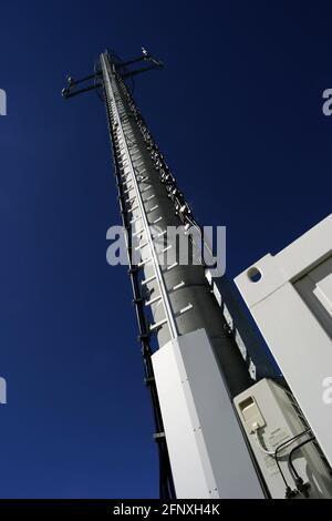 transmitter mast and blue sky Stock Photo
