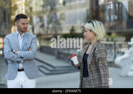 Two business partners are talking about the new plan Stock Photo