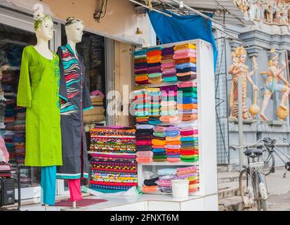 mannequins and coloured fabric outside saravana tex store adjacent to nallur sivan temple jaffna northern province sri lanka