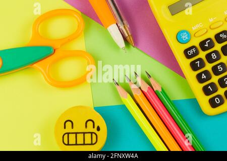Colorful school background. School accesories on colorful background. Stock Photo