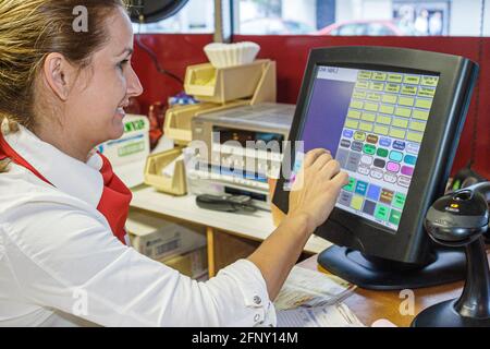 Miami Florida,Navarre Spanish Tavern restaurant,Hispanic woman female cashier waitress server transaction,touch screen touchscreen computer monitor Stock Photo