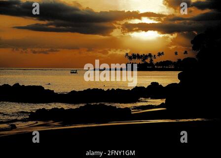 A vivid sunset  on the western side of Lombok, Indonesia. Stock Photo