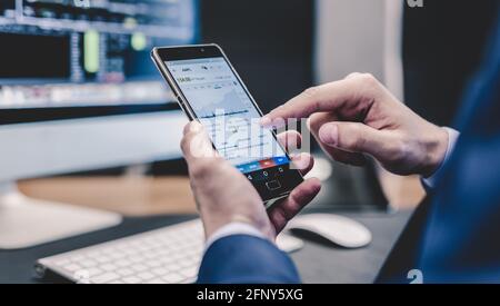 Close up of businessman using mobile smart phone. Stock Photo