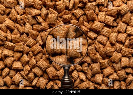 chocolate pillows background texture, brown choco cereal pads pattern