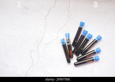 Top view of blood test tube and laboratory equipment on table  Stock Photo