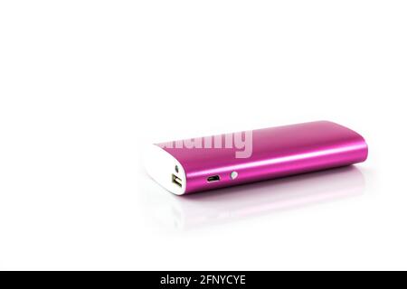 Pink color power bank on white background Stock Photo