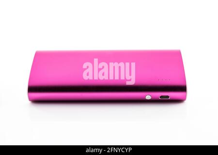 Pink color power bank on white background Stock Photo