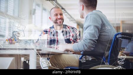 Composition of data processing over two businessmen talking in office Stock Photo