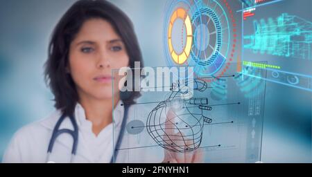Digital interface with medical data processing against female doctor touching invisible screen Stock Photo