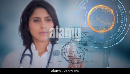 Digital interface with medical data processing against female doctor touching invisible screen Stock Photo