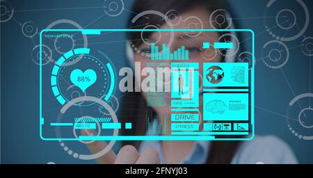 Composition of businesswoman touching digital screen with medical data processing Stock Photo