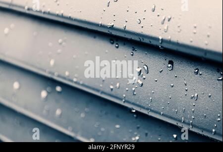 Macro of raindrops on the shutter, detail Stock Photo