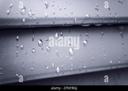 Macro of raindrops on the shutter, detail Stock Photo