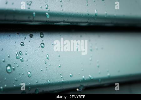 Macro of raindrops on the shutter, detail Stock Photo
