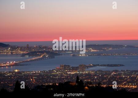 Aerial view of Oakland and San Francisco Bay at Sunset, San Francisco Bay Area, California, USA
