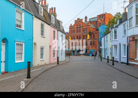 View of colourful houses leading to the Brewers Quay at dusk, Weymouth, Dorset, England, United Kingdom, Europe Stock Photo