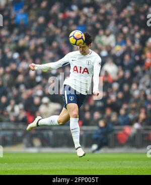 Heung-Min Son of Spurs heads in their second goal during the Premier League match between Tottenham Hotspur and Huddersfield Town at Wembley Stadium in London. 03 Mar 2018 - Editorial use only. No merchandising. For Football images FA and Premier League restrictions apply inc. no internet/mobile usage without FAPL license - for details contact Football Dataco Stock Photo