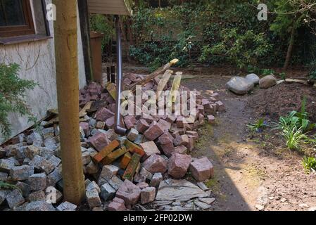 A stack of red, granite paving stones in the garden Stock Photo
