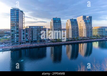 View of modern apartments reflection in water in Salford Quays, Manchester, England, United Kingdom, Europe Stock Photo