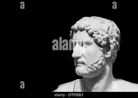 Black and white photo of male profile of ancient roman statue Stock Photo