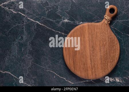 cutting board on a marble table, top view Stock Photo