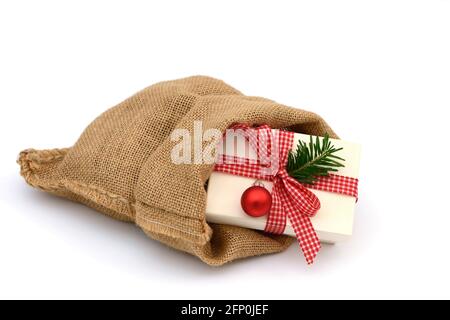 Xmas present in santa bag Stock Photo