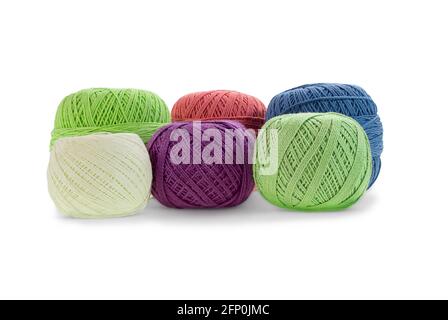 Yarn of wool for knitting on white background. Green, pink, blue, purple tangle. Needlework, handmade. Isolated. Copy space Stock Photo