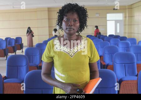(210520) -- JUBA, May 20, 2021 (Xinhua) -- Mary Angela, a 34-year-old South Sudanese nurse, is seen after attending the medical Chinese language lessons at Juba Teaching Hospital in South Sudan, May 19, 2021. South Sudanese health workers have started learning the Chinese language at Juba Teaching Hospital in the country's capital city. This will strengthen collaboration between local staff and Chinese doctors in the country.TO GO WITH 'Feature: South Sudan health workers emboldened to learn Chinese language' (Photo by Denis Elamu/Xinhua) Stock Photo