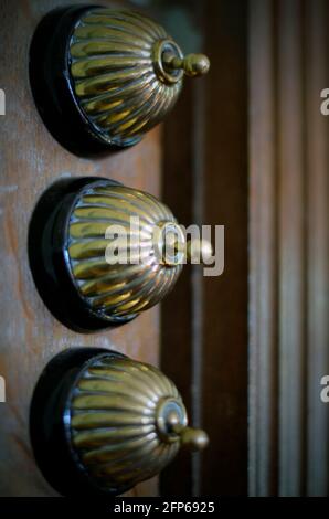 old fashioned vintage electric room light switches Stock Photo