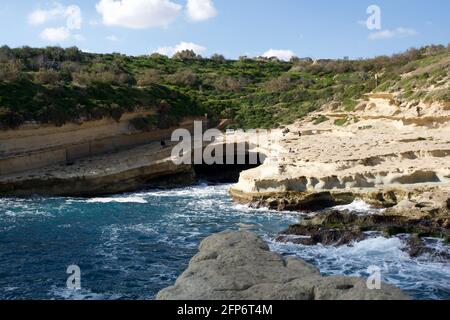 MARSAXLOKK, MALTA - 03 JAN, 2020: Beautiful view over St. Peter Pool in winter with churned up Mediterranean Sea Stock Photo