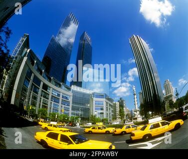 2005 HISTORICAL YELLOW TAXI CABS (©FORD MOTOR CO 2000) TIME WARNER CENTER TOWERS (©DAVID CHILDS 2003)COLUMBUS CIRCLE MANHATTAN NEW YORK CITY USA Stock Photo