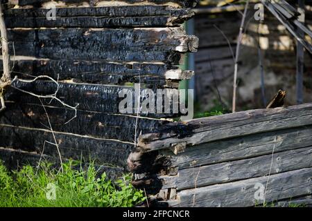 Shallow depth of field (selective focus) details with burned wood from a burnt house. Stock Photo