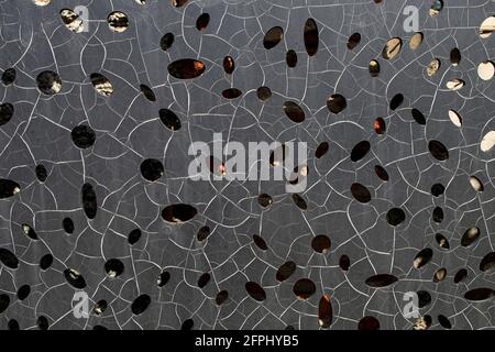 Mesh fabric background. Patterned iron protective lattice. Garden and courtyard landscaping and design element Stock Photo