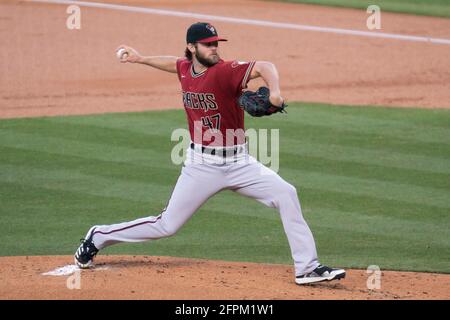 Arizona Diamondbacks' Matt Peacock (47) scores a run in the fourth ...