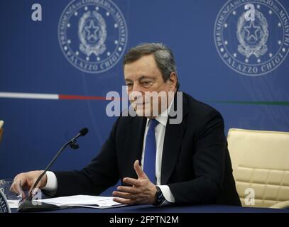 Rome, Italy. 20th May, 2021. Italian Prime Minister Mario Draghi speaks at a news conference in Rome, Italy, on May 20, 2021. The Italian government on Thursday approved a 40-billion-euro (48.9-billion-U.S. dollar) relief package to support the country's businesses and workers affected by the COVID-19 restrictions. The new relief measures included 17 billion euros of financial aid to companies, and nine billion euros for business credit support, according to Prime Minister Mario Draghi. Credit: Str/Xinhua/Alamy Live News Stock Photo