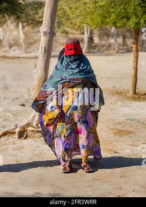 Bandari woman with traditional mask called 'Burqa' in Minanb, Hormozgan Province of Iran. Stock Photo