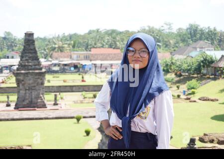 Indonesian Junior High School student spent a holiday on Penataran Temple, Blitar East Java Indonesia Stock Photo