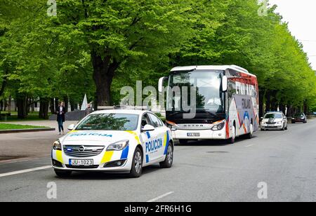 Riga, Latvia. 20th May, 2021. The bus of team Finland is escorted to practice arena by police before the 2021 IIHF Ice Hockey World Championship in Riga, Latvia, on May 20, 2021. The Ice Hockey World Championship will kick off in Riga on May 21, with the final scheduled for June 6. Credit: Edijs Palens/Xinhua/Alamy Live News Stock Photo