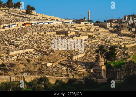 Absalom tomb and Jewish Cemetery in Kidron Valley, Jerusalem, Israel Stock Photo