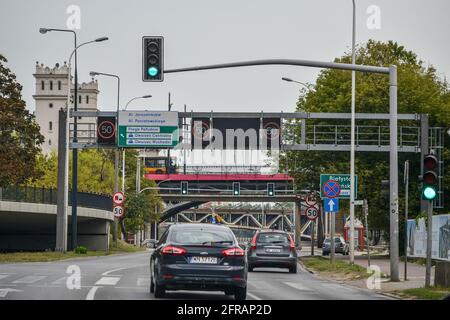 WARSAW. POLAND - AUGUST 2015: Road, speed limit signs, the traffic light shines green. High quality photo Stock Photo