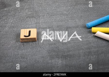 Riga, Latvia - May 10 ,2021: Java code and programming language concept. Colored chalk pieces on a black chalk board Stock Photo