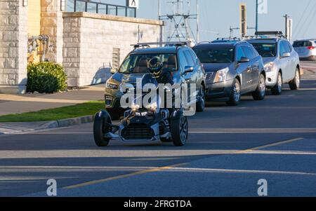 Biker on Black motorcycle BRP Can Am Ryker on the street of the Guilford,BC,Canada-April 18,2021. Travel photo, street view, concept photo sports bike Stock Photo