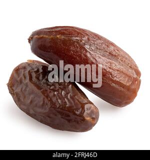 Two dry pitted dates isolated on white.