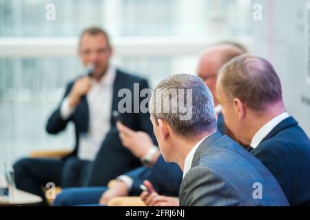 Businessmen discussing ideas during conference Stock Photo