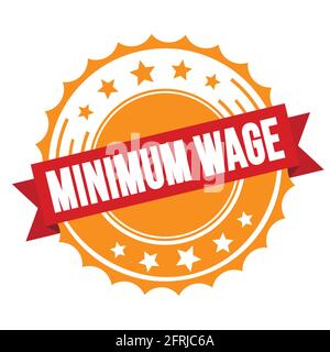 MINIMUM WAGE text on red orange ribbon badge stamp. Stock Photo