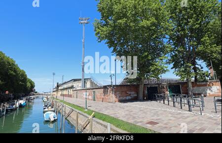 Venice, VE, Italy - July 13, 2020: stadium calle PENZO near navigable canal in Veneto Region Stock Photo