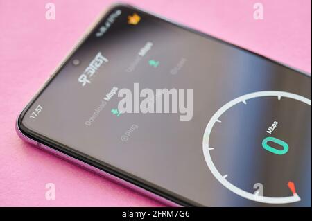 New york, USA - April 23, 2021: Internet connection speed test menuon smartphone screen macro close up view Stock Photo