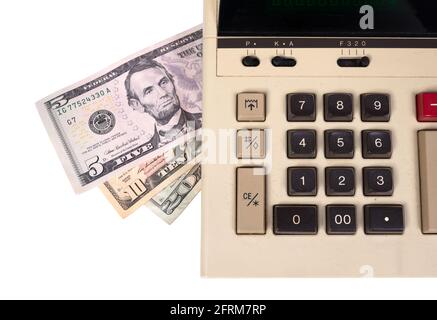 Old fashioned calculator dollars, isolated on white Stock Photo