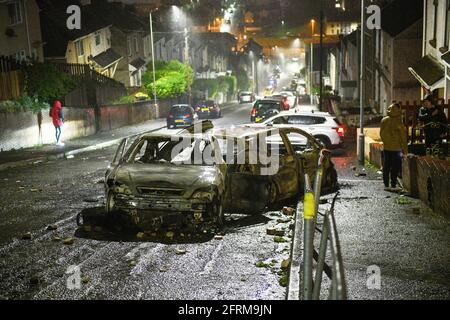 The aftermath of a riot in the Mayhill area of Swansea, which saw police attacked and several cars in the area torched during large scale disorder on the council estate. It is believed locals reacted when police turned up to a memorial that was taking place for a local man who had recently died. Stock Photo